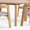 HARESKOV + BOVRUPMesa HARESKOV Ø129 roble natural + 4 sillas BOVRUP roble